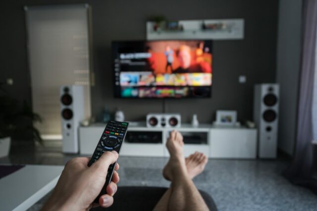 Remote Control with Connected Television in living room