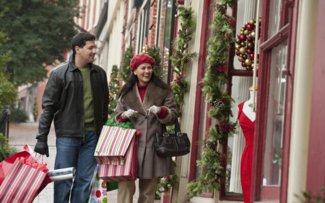 Hispanic couple shopping at Christmas